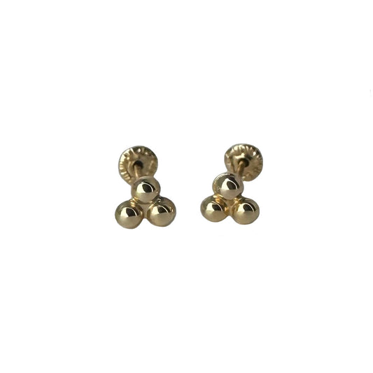 detailed photograph of small gold earrings